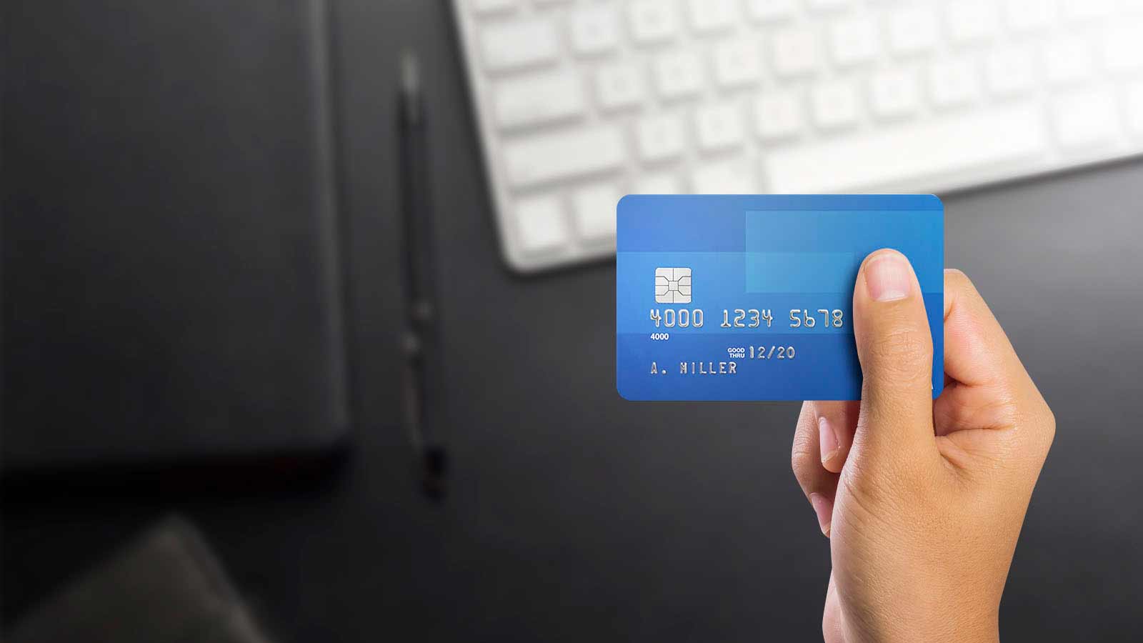 person holding card